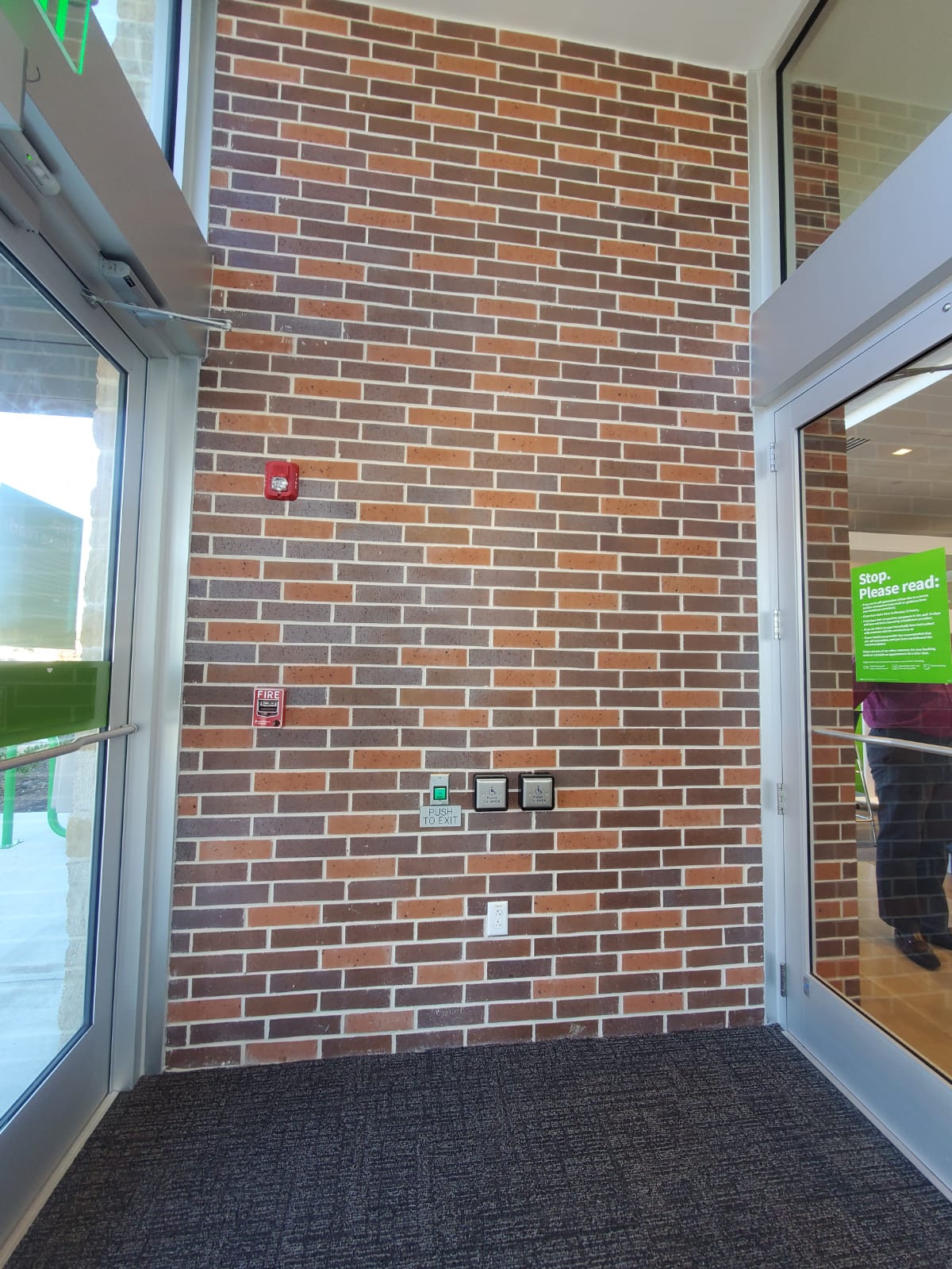 Brick masonry wall in progress with consistent coursing